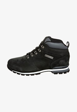 Black leather hiking boot with gray accents, lace-up design, padded collar, and textured sole. Features a silver logo on the side.