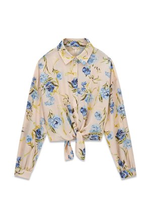 Beige blouse met lange mouwen met blauw bloemenpatroon, knoopsluiting aan de voorkant, kraag en een strik aan de voorkant bij de taille.