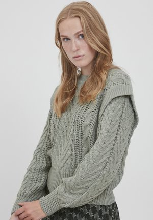 Strickpullover in Hellgrün mit Zopfmuster, gerippten Bündchen und Rundhalsausschnitt. Verfügt über ein strukturiertes Design an den Ärmeln.