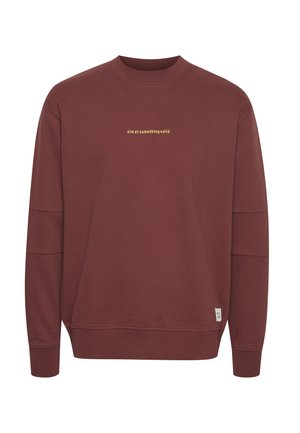 Bordeaux värvi puuvillasegusest sweatshirt, mis on ümmarguse kaelusega, pika varrukaga ja millel on rinnal kollase trükitud loosung.