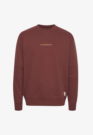 Bordeaux värvi puuvillasegusest sweatshirt, mis on ümmarguse kaelusega, pika varrukaga ja millel on rinnal kollase trükitud loosung.