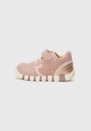 Rosa Kinder-Sneaker mit Klettverschluss, aus Gummi und synthetischen Materialien gefertigt, mit Sternenmustern und einem Glitzerelement an der Ferse.