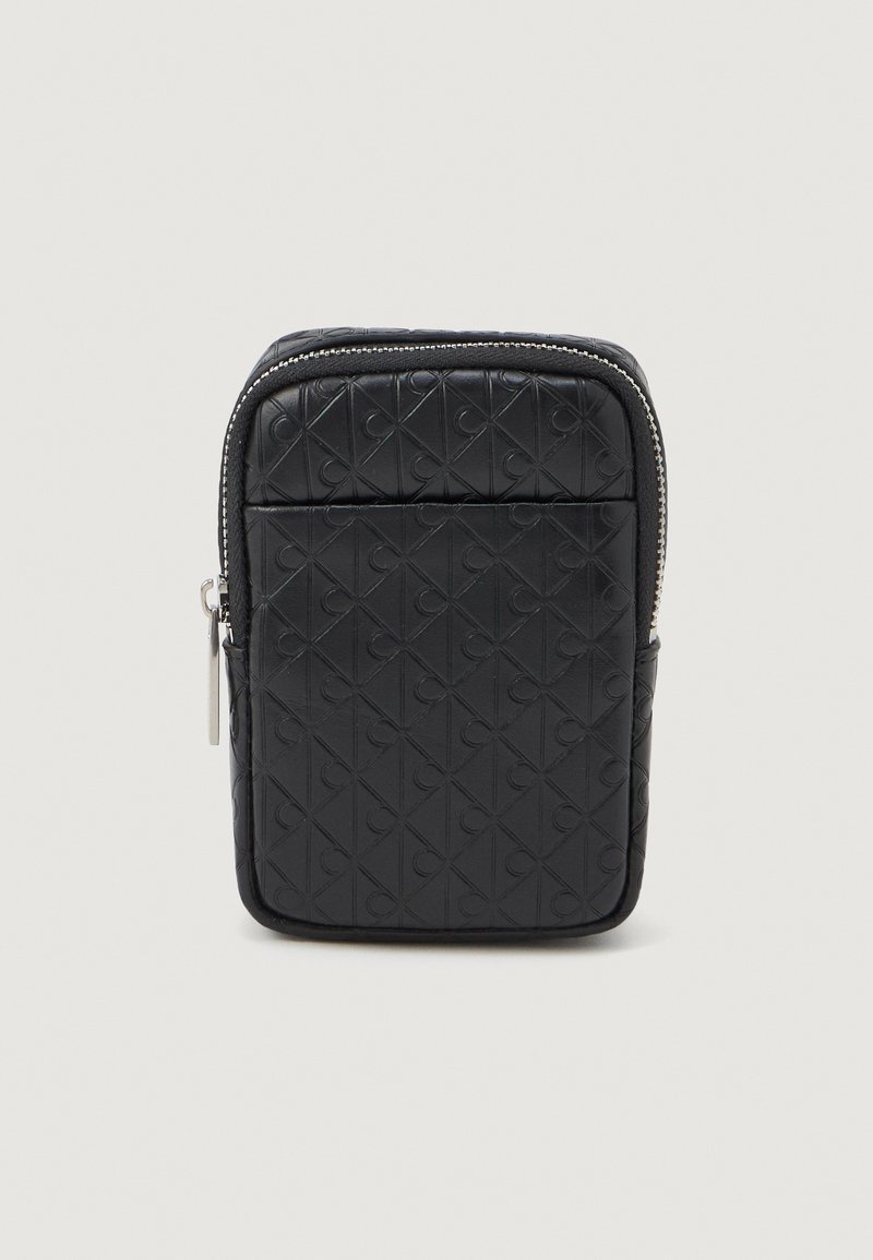 Calvin Klein EMBOSSED EMBLEM BAG TAG UNISEX - Wallet - black - Zalando ...