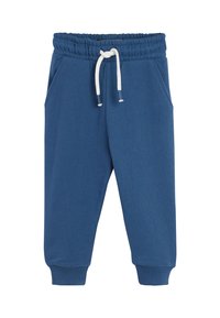 Blå bomulds sweatsbukser med elastisk talje, justerbar snøring, sidelommer og ribbede manchetter ved anklerne.