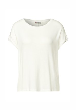 Camiseta blanca de manga corta con cuello redondo, hecha de una tela suave, que presenta un ajuste relajado y detalles de costura sutiles en las mangas.