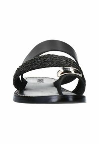Black flat sandals with two straps, one smooth and one textured woven. Features a small metal accent. Leather upper with flat sole.