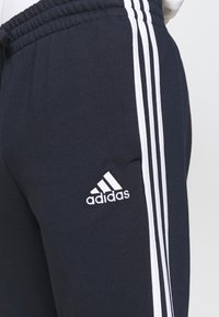 adidas Performance ESSENTIALS 3STRIPES - Trainingsbroek - legend ink/white