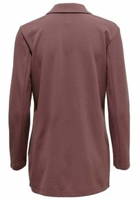 Blouse à manches longues de couleur mauve poussiéreuse, dotée d'un col à revers, d'une texture de tissu lisse, et d'une coupe droite sans ornements apparents.