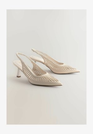 Beige siksnas sandales ar norādītajiem pirkstiem, ar izgrieztu svītru dizainu, austu apdari un mazu blokveida papēdi. Gluda virsmas apdare.