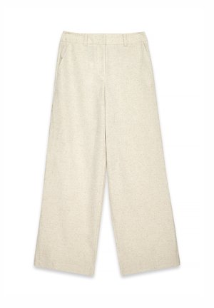 Pantalons larges beige clair en tissu texturé, avec une taille élastique et deux poches latérales, conçus pour un ajustement ample.