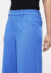 Object OBJLISA WIDE NOOS - Stoffhose - palace blue