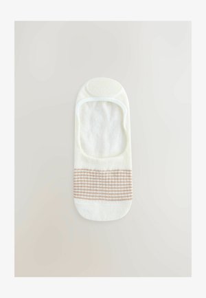 Kotníkové ponožky vyrobené z bílé bavlny, s béžovým kostkovaným pruhem kolem horní části. Mají protiskluzovou gripovou část na patě.