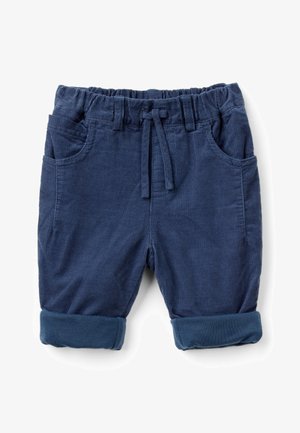 Pantaloni corti in velluto a coste blu navy con vita elasticizzata, tasche frontali e risvolti. La texture è a coste e morbida. Coulisse per la regolazione.
