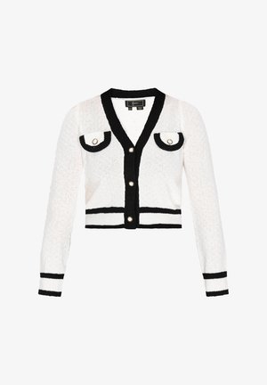 Fehér, rövid szabású kardigán fekete díszítéssel, mély V-nyakkal, aranygombokkal és két mellzsebével, lekerekített fedéllel. Texturált kötött anyag.