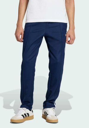 - Spodnie treningowe