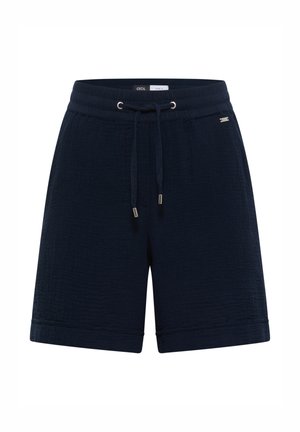 Shorts bleu marine longueur genou avec taille élastique et cordon, tissu texturé, et petite étiquette métallique de marque sur le côté.
