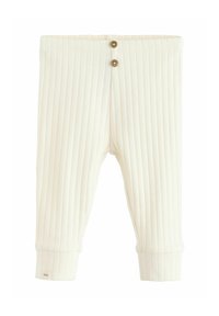 Pantalons crèmes côtelés pour tout-petits avec un design ajusté, comportant deux boutons décoratifs à la taille et des poignets élastiques aux chevilles.
