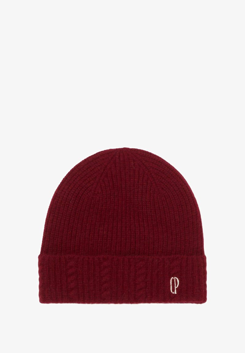 Gorro de punto rojo con textura acanalada y dobladillo plegado. Presenta un pequeño logotipo bordado en blanco en la parte frontal. Material suave y elástico.