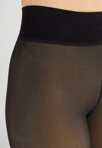 Damart EFFET TRANSPARENT - Collant - noir