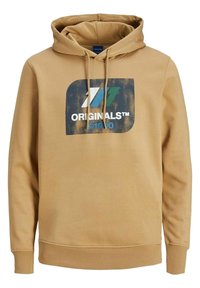 Sweat à capuche beige avec cordons de serrage et un motif bleu, blanc et vert vieilli indiquant "ORIGINALS™ 1910" sur la poitrine.