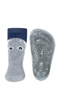 Szare skarpetki z granatowym mankietem, na którym znajdują się oczy postaci z kreskówki. Podeszwa ma teksturowaną, gumowaną powierzchnię zapewniającą przyczepność.