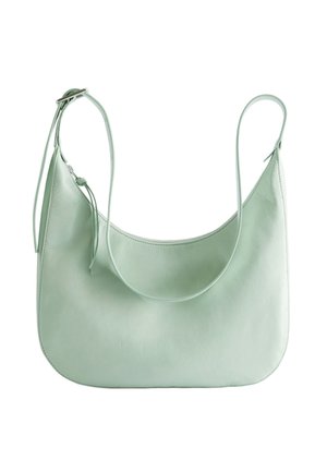 Miętowa torebka na ramię ze skóry z regulowanym paskiem i zamkiem błyskawicznym, gładka faktura, minimalistyczny design, zaokrąglone dolne krawędzie.