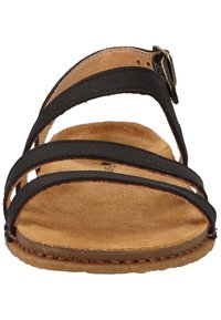 Black leather sandal with three straps, adjustable buckle, and suede insole. Flat sole with visible stitching and rounded toe design.