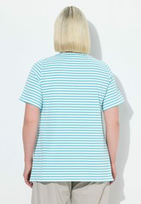 Gestreept T-shirt in lichtblauw en wit, met een ronde hals en korte mouwen. Casual pasvorm met een rechte zoom, gemaakt van zachte stof.
