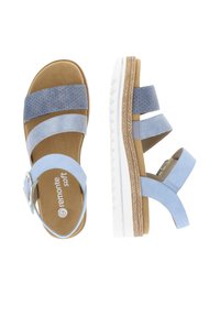 Light blue sandals with two textured straps and one smooth strap. Cushioned insole, white rubber sole, and adjustable buckle detailing.
