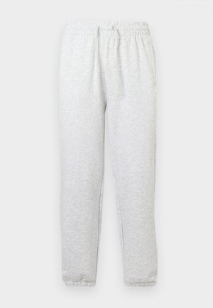 Light grey sweatpants made of soft material, featuring an elastic waistband with drawstrings and elastic cuffs at the ankles.
