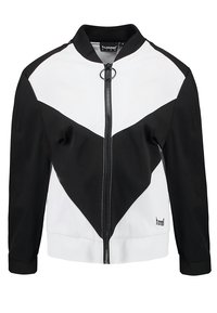 Svart och vit bomberjacka med färgblockdesign, dragkedjestängning, ribbade muddar och logotypdetalj på framdelen.