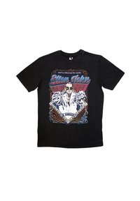 Black cotton t-shirt featuring a colorful graphic of Elton John in a flashy outfit, bold text, and concert details in blue and red accents.