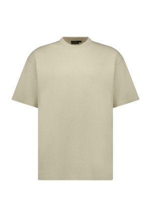 Beige oversized T-shirt met een ronde hals en korte mouwen, gemaakt van katoen met een gladde textuur en minimale details.