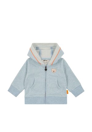 Light blue zip-up hoodie made of soft fabric with a bear patch on left chest, two front pockets, and gray accents on the hood and cuffs.