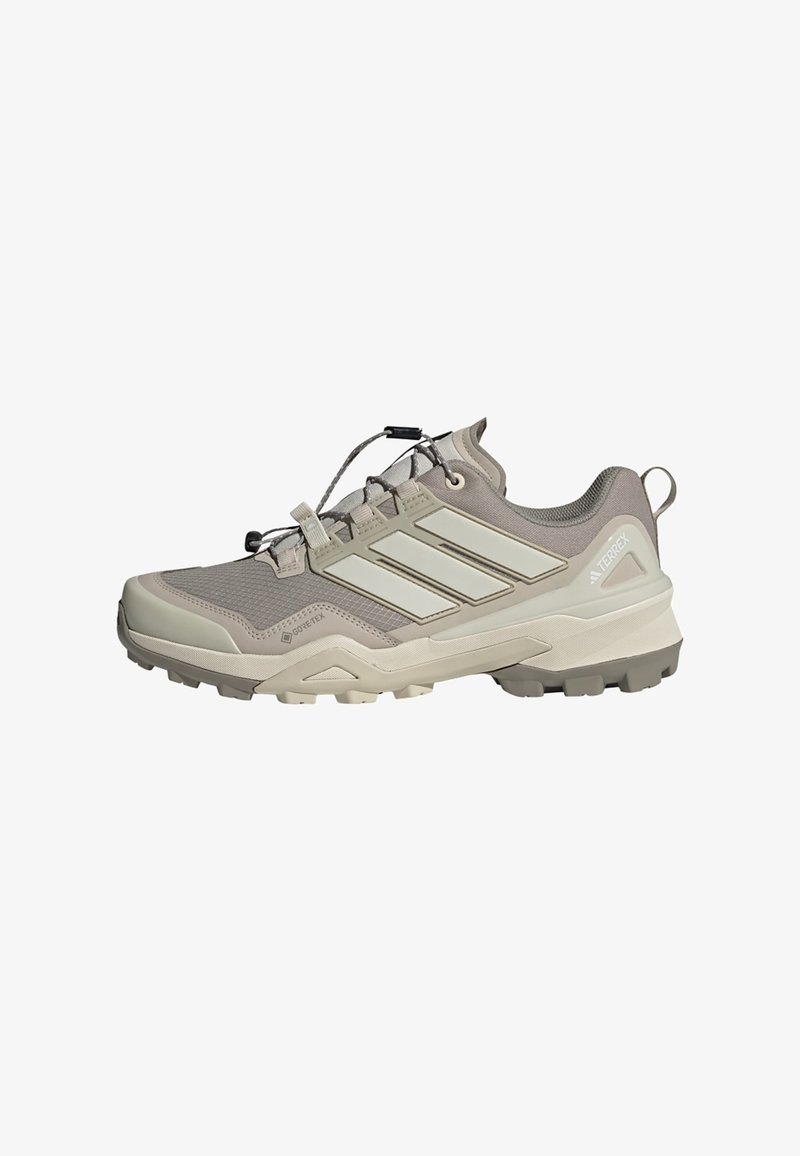 Lightweight gray hiking shoe with a mesh upper, rubber outsole, and adjustable lacing system. Features three white stripes on the side.