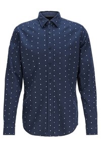 Marineblauwe button-up shirt met kleine witte geometrische patronen, lange mouwen en een klassieke kraag met een knoopsluiting.