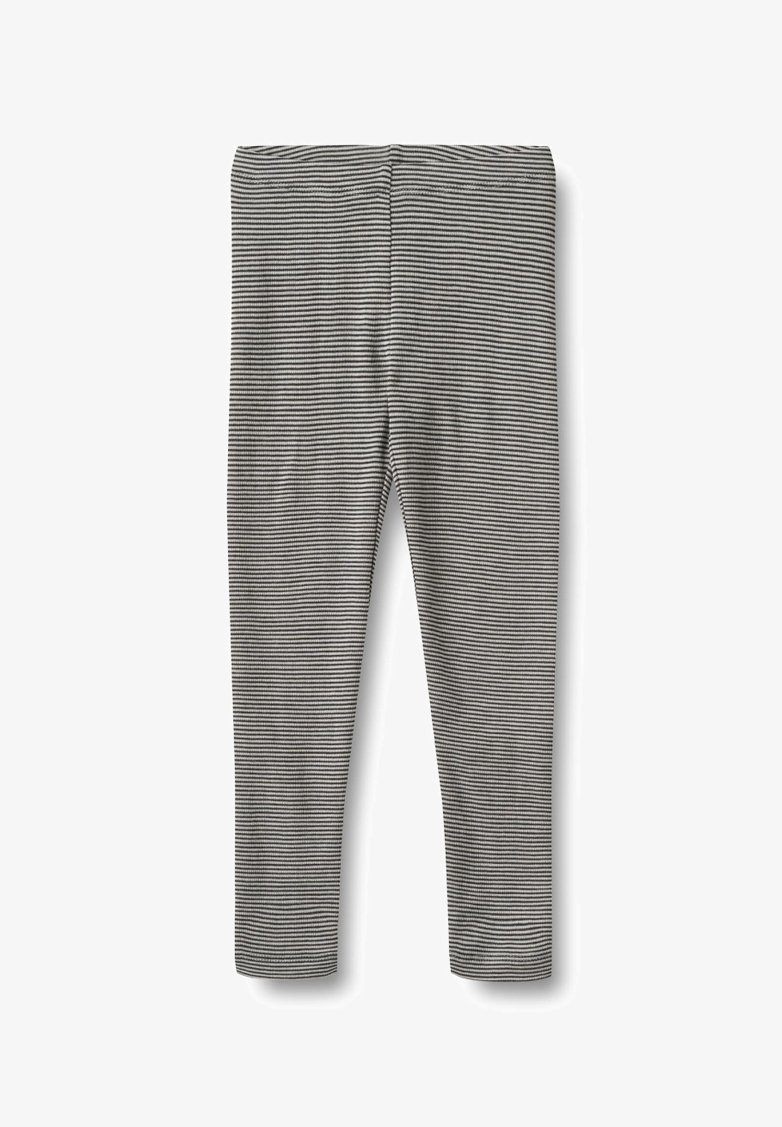 Leggings rayés noir et blanc, présentant un design en tissu extensible et une silhouette ajustée, texture lisse et taille élastique.