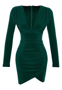 Robe longue verte à manches longues avec un décolleté en V profond, texture froncée et ourlet asymétrique. Fabriquée en tissu lisse et extensible. Fermeture éclair au dos.