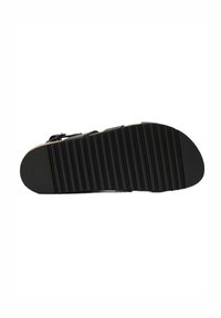 Black rubber sole with a ridged texture, featuring a rounded toe and flat shape. Includes a smooth finish and lateral arch design.