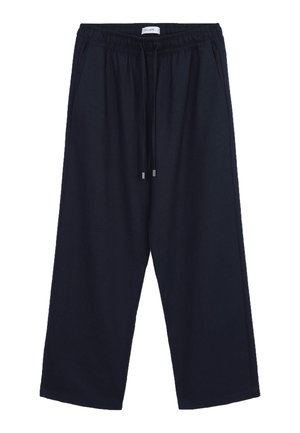 Marineblaue weit geschnittene Hose aus weichem Stoff. Mit elastischem Bund und Zugband sowie Seitentaschen. Minimalistisches Design.