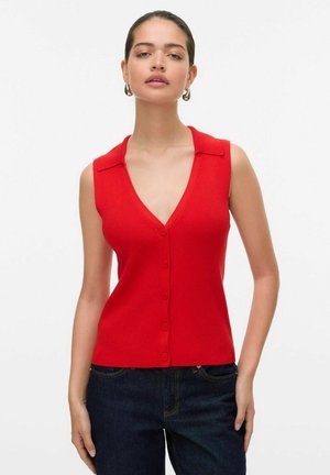 Top de punto sin mangas color rojo con cuello tipo polo y abertura frontal con botones, que presenta una textura acanalada y un diseño ajustado.