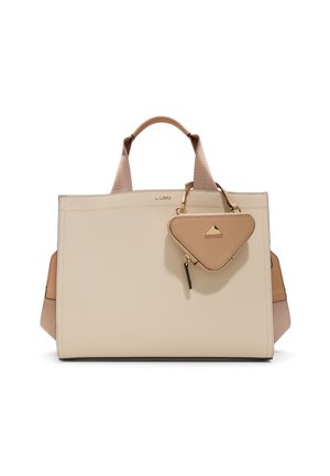 Beige faux leather tote bag with smooth texture, geometric design, dual top handles, and a detachable triangle-shaped charm. Gold hardware accents.