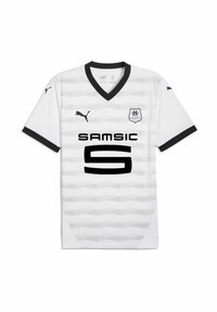 Biely futbalový dres s výstrihom do V a čiernymi akcentami. Obsahuje vzor svetlosivých trojuholníkov a výrazný čierny nápis "SAMSIC" a číslo "5."