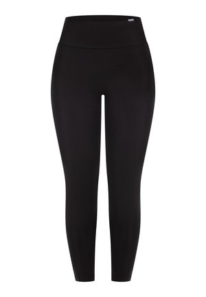 Leggings noirs en matériau extensible avec une taille haute et une texture lisse et mate, présentant un branding subtil près de la taille.
