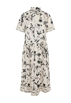 Jurk met bloemenprint, korte mouwen, knoopsluiting en poftaille. Crèmekleurige ondergrond met zwarte bloemmotieven en handgeschreven accenten.