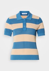 Πόλο πουκάμισο κοντομάνικο με μπλε και μπεζ οριζόντιες ρίγες, τρία κουμπιά και ριμπέ κολάρο και μανίκια.