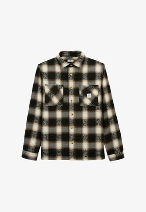 Chemise à carreaux noire, blanche et beige, à manches longues et deux poches poitrine, dont une avec un petit patch logo carré.