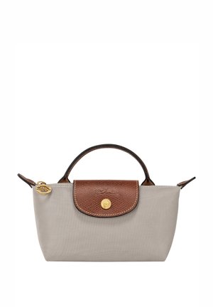 Grey nylon bag with brown leather flap and handle. Features gold hardware and embossed detailing on the flap. Compact, structured design.