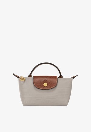 Grey nylon bag with brown leather flap and handle. Features gold hardware and embossed detailing on the flap. Compact, structured design.