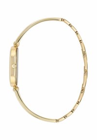 Gold metal bracelet watch with a rectangular case, smooth surface, slim design, and linked band featuring small hardware accents.